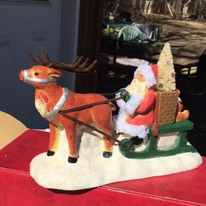 Santa on sled Christmas decor